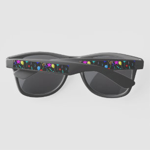 Colourful party balloons and stars sunglasses