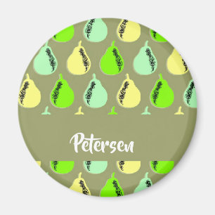 Colourful pears on green magnet
