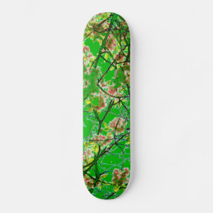 Colourful pink green abstract floral design skateboard