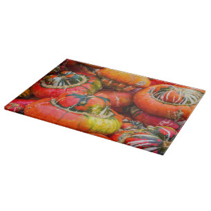 Colourful pumpkins cutting board