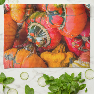 Colourful pumpkins tea towel