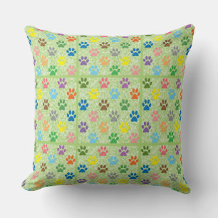 Colourful puppy paw prints cushion