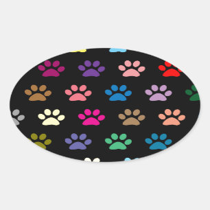 Colourful puppy paw prints on black oval sticker