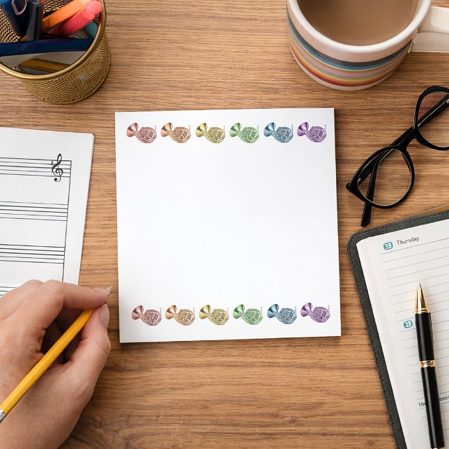 Colourful Rainbow French Horn Musical Instrument Notepad (A notepad featuring two rows of french horns in a rainbow of colors.)