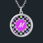 Colourful Retro Flower Pattern Monogram Silver Plated Necklace<br><div class="desc">This pretty, girly design features a bright, colourful floral pattern in shades of pink, purple, blue and green on a black background. It has a flower - shaped space in orchid - purple where you can add your monogram / initial in white to personalise. It's a slightly retro, very chic...</div>