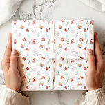 Colourful Simple Merry Christmas Wrapping Paper<br><div class="desc">The wrapping paper features a simple and elegant holiday theme. A thin branch adorned with various hanging ornaments,  including a reindeer,  a rainbow-coloured ball,  patterned baubles,  a mushroom,  and a Santa figurine,  adds a whimsical and festive touch.</div>
