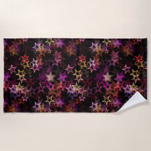 Colourful Stars Dance Whimsically  Beach Towel