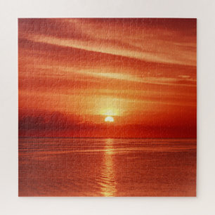 Colourful sunrise at sea, dramatic clouds. jigsaw puzzle