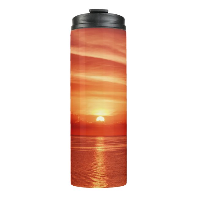 Colourful sunrise at sea, dramatic clouds. thermal tumbler (Front)