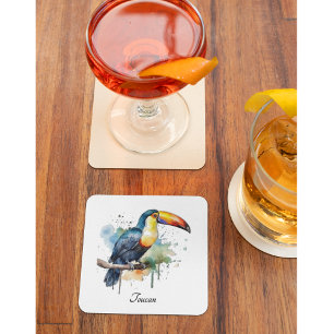 colourful toucan sitting on a branch glass coaster