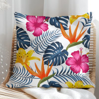 Colourful tropical design on a white pillow