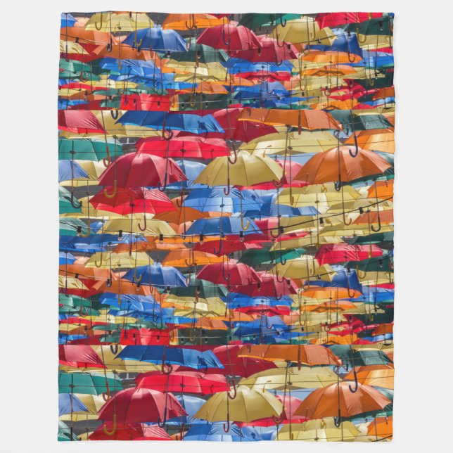 Colourful umbrellas in the sky blue orange red  fleece blanket (Front)