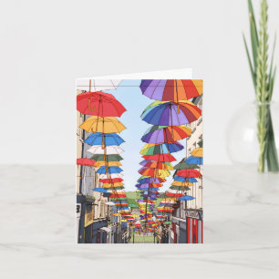 Colourful umbrellas view greeting card