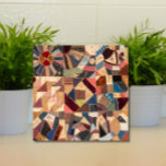 Colourful Vintage Patchwork Crazy Quilt Rustic Tile<br><div class="desc">Add rustic retro charm to your home with this striking vintage patchwork crazy quilt pattern ceramic tile. A bold, colourful geometric design to add instant personality to your kitchen backsplash or counter, bathroom, fireplace or other tiled space. Also makes a great trivet. The warm earth tone palette complements both country...</div>