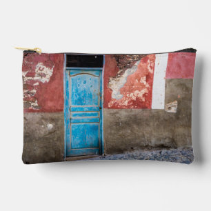 Colourful wall with blue door accessory pouch