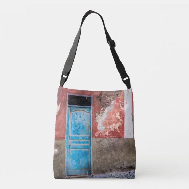 Colourful wall with blue door crossbody bag (Back)