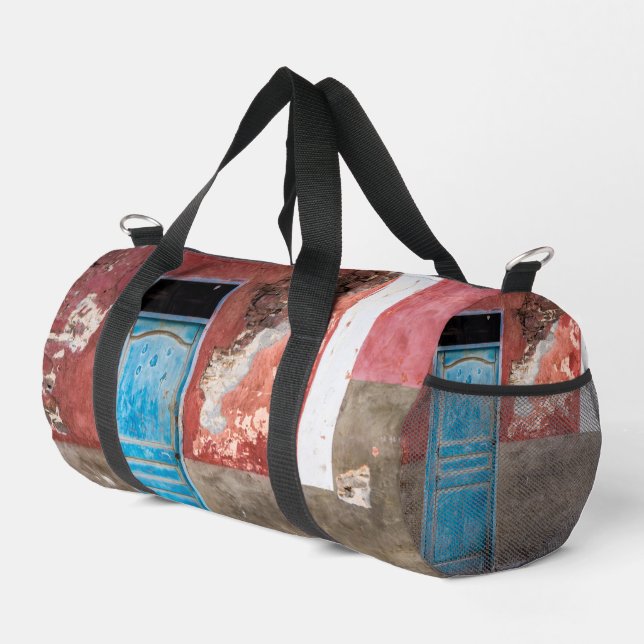 Colourful wall with blue door duffle bag (Right Corner)