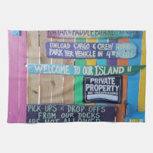Colourful Welcome Island sign Carribean Tea Towel