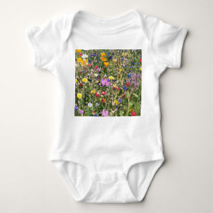 Colourful wildflower meadow, vibrant pattern. baby bodysuit