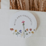 Colourful Wildflower Wild And Onederful Birthday 6 Cm Round Badge<br><div class="desc">This colourful wildflower wild and onederful birthday button is perfect for your simple, whimsical, boho rainbow summer celebration. The bright, enchanted pink, yellow, orange, and gold colour florals give this product the feel of a minimalist, elegant, vintage hippie spring garden. The modern design is artsy and delicate, portraying a classic...</div>
