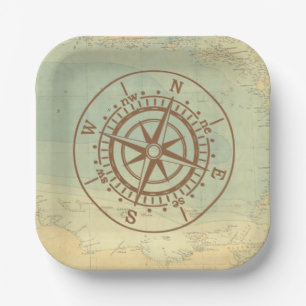 Compass on old map travel paper plate