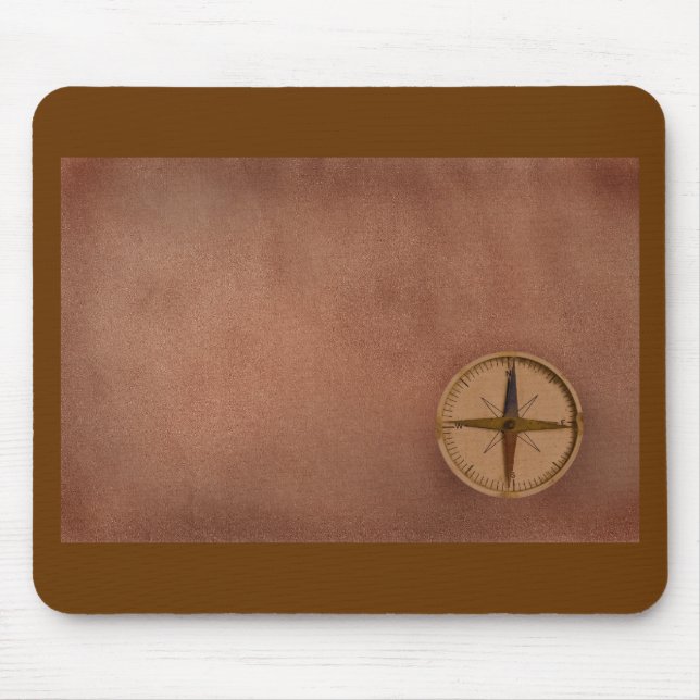 compass on old paper mouse pad (Front)