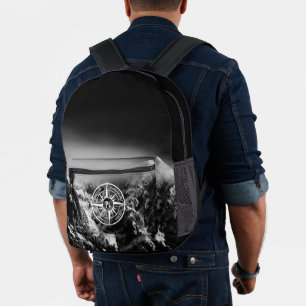 Compass star emblem monogram dramatic mountains printed backpack
