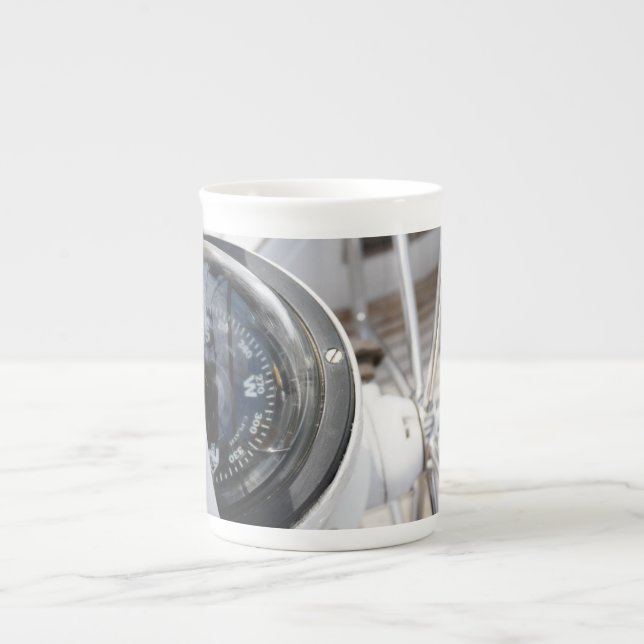 Compass that gives direction to an adventure.  bone china mug (Front)