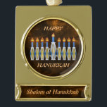 Completely Customisable Shalom Hanukkah Menorah Gold Plated Banner Ornament<br><div class="desc">This striking ornament has all the makings of a Chanukah keepsake any way it is customised: the stylised menorah with the Hebrew characters in the candles' flames; the phrases, "Happy Hanukkah" and "Shalom at Hanukkah"; the warm backgrounds of brown with peach-coloured nebulae, both in the central circular cutout and the...</div>