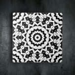 Complex Black and White Geometric Pattern Tile<br><div class="desc">This decorative ceramic tile features a complex geometric pattern that is both captivating and intricate. The design is composed of a stark contrast between black and white hues. At the heart of the tile is a prominent star-like shape, which forms the nucleus of the design. From this central point, a...</div>