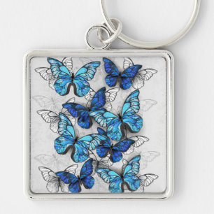 Composition of White and Blue Butterflies Key Ring