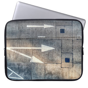 Concrete road with painted arrow directions laptop sleeve
