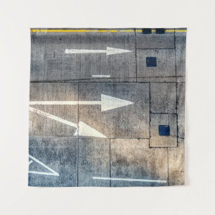 Concrete road with painted arrow directions tapestry