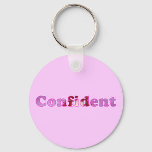Confident spelled with pink flowers Key Chains