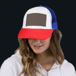 Confidently Against a Stylish Brown Wall Trucker Hat<br><div class="desc">Step up your game with a classy businessman's outfit. This man in a suit and tie exudes confidence and style against a sleek brown wall,  ideal for a formal setting."</div>