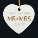 Congratulations to New Mr and Mrs Name Foliage Ceramic Tree Decoration<br><div class="desc">The happy couple will be able to treasure this this romantic heart shape ornament, which you can hand them as they leave their ceremony congratulating the New Mr and Mrs. The set typography for Mr & Mrs has a jungle like color scheme in shades of dark green, orange and khaki...</div>
