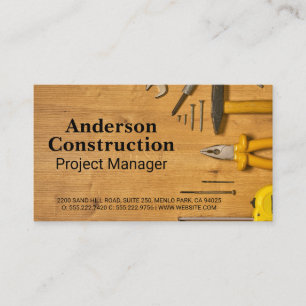 Construction Hand Tools on Wooden Table Business Card