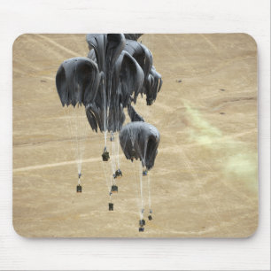 Container delivery system bundles parachute mouse pad