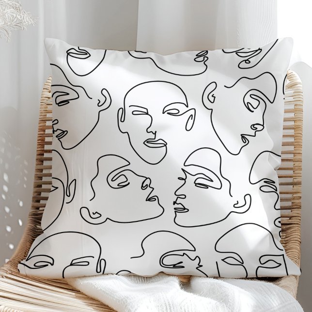Contemporary Line Art Drawing Faces Cushion (Contemporary Line Art Drawing Faces Throw Pillow on a sunny rattan armchair.)