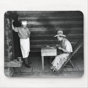 Cook watching a cowboy play cards mouse pad