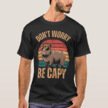 Cool Capybara Don’t Worry Be Capy Funny Sunglasses T-Shirt<br><div class="desc">Embrace the relaxed vibes with our ‘Don’t Worry Be Capy’ T-shirt featuring a cool capybara wearing sunglasses. This fun and quirky design is perfect for animal lovers and anyone who enjoys a laid-back lifestyle. Made from soft, high-quality fabric, this tee is great for casual outings, beach days, or just chilling...</div>