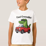 Cool Crocodile Cartoon in Sunglasses Driving a Car T-Shirt<br><div class="desc">Add a playful and fun vibe to your products with this cool cartoon crocodile illustration! Featuring a cheerful green crocodile rocking stylish sunglasses while cruising in a bright red car, this design is perfect for kids, humour lovers, and anyone who enjoys quirky, eye-catching artwork. Ideal for t-shirts, stickers, mugs, and...</div>