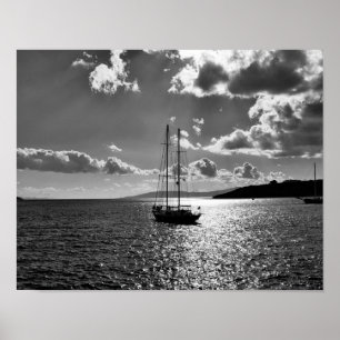 Cool dramatic sky over yacht on sea poster