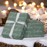 Cool Merry Christmas script font green pattern Wrapping Paper<br><div class="desc">Merry Christmas script typography white on green pattern,  all the colours are editable, </div>