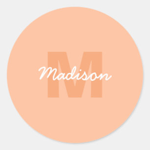 Cool pastel peach colour with Custom Monogram name Classic Round Sticker