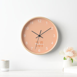 Cool pastel peach colour with Custom Monogram name Clock