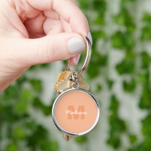 Cool pastel peach colour with Custom Monogram name Key Ring
