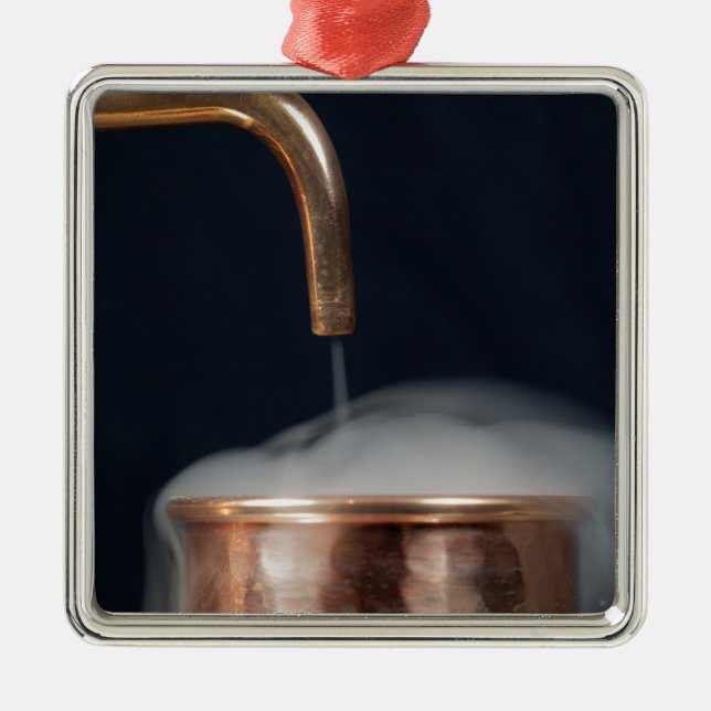copper pipe of a distillery with steam. metal tree decoration (Front)