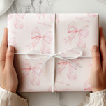 Coquette Pink Bow Wrapping Paper<br><div class="desc">Add a touch of sophistication to your gift-giving with this Elegant Pink Bow Wrapping Paper. 
Featuring delicate,  soft blush pink bows beautifully arranged on a white background,  this design is perfect for showers,  birthdays and other special occasions.</div>