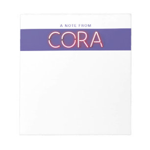 Cora name in glowing neon lights notepad